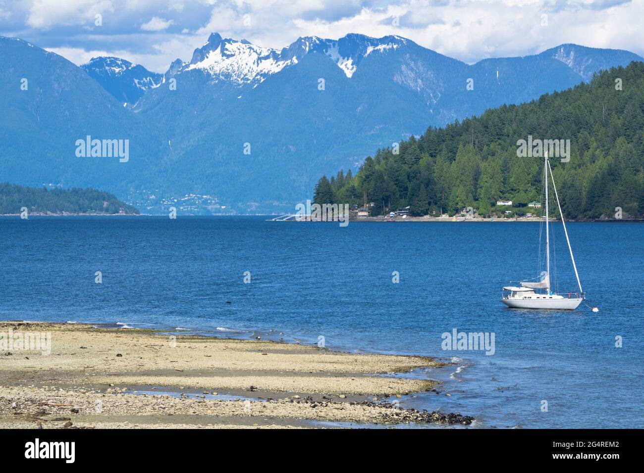 View of Coastal mountains from Armours Beach in Gibsons, British Columbia, Canada.  West Coast. Stock Photo