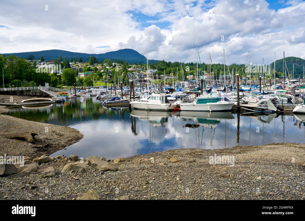 Boats in the marina by the shoreline in Gibsons, British Columbia, Canada. Stock Photo