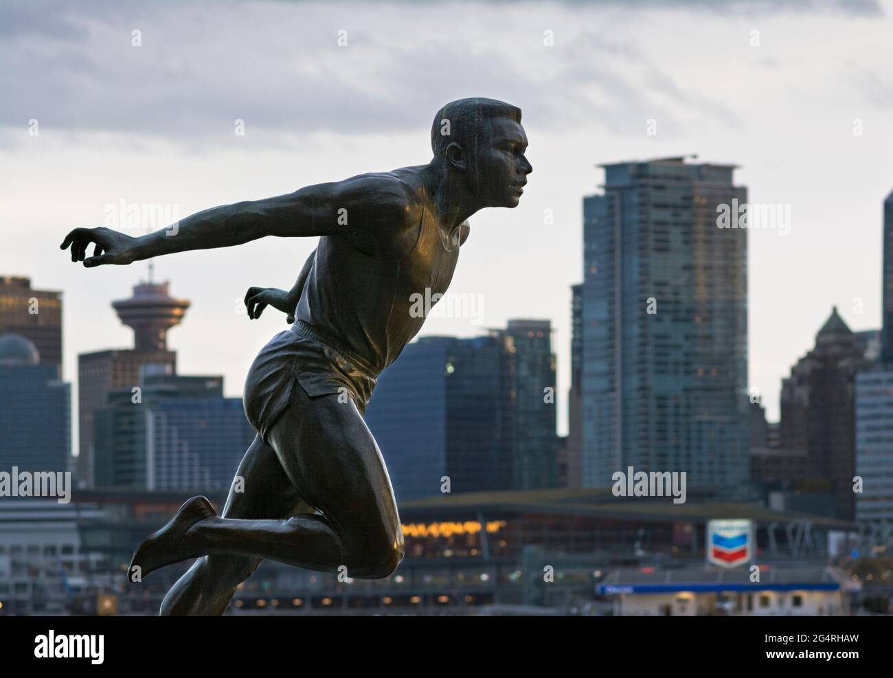 Harry Jerome statue on the Stanley Park seawall in Vancouver, BC, Canada. Stock Photo