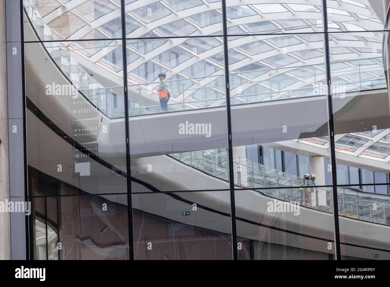 Edinburgh, United Kingdom. 23 June, 2021 Pictured: Construction workers complete the final touches to the St James Quarter which opens in Edinburgh. The first phase of the shopping centre will open on 24th June 2021 Credit: Rich Dyson/Alamy Live News Stock Photo