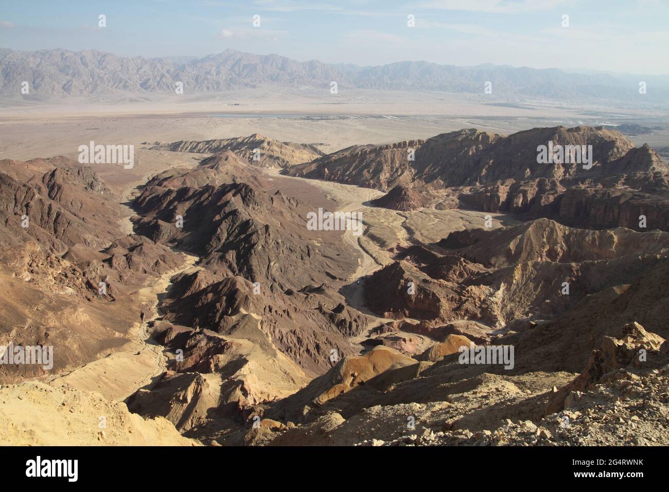 Dry riverbed of Nachal Amram Amram Heights, see the Granite & Limestone Eilat Mountains, Arava Valley - in Rift Valley & Edomite Mountains in Jordan. Stock Photo
