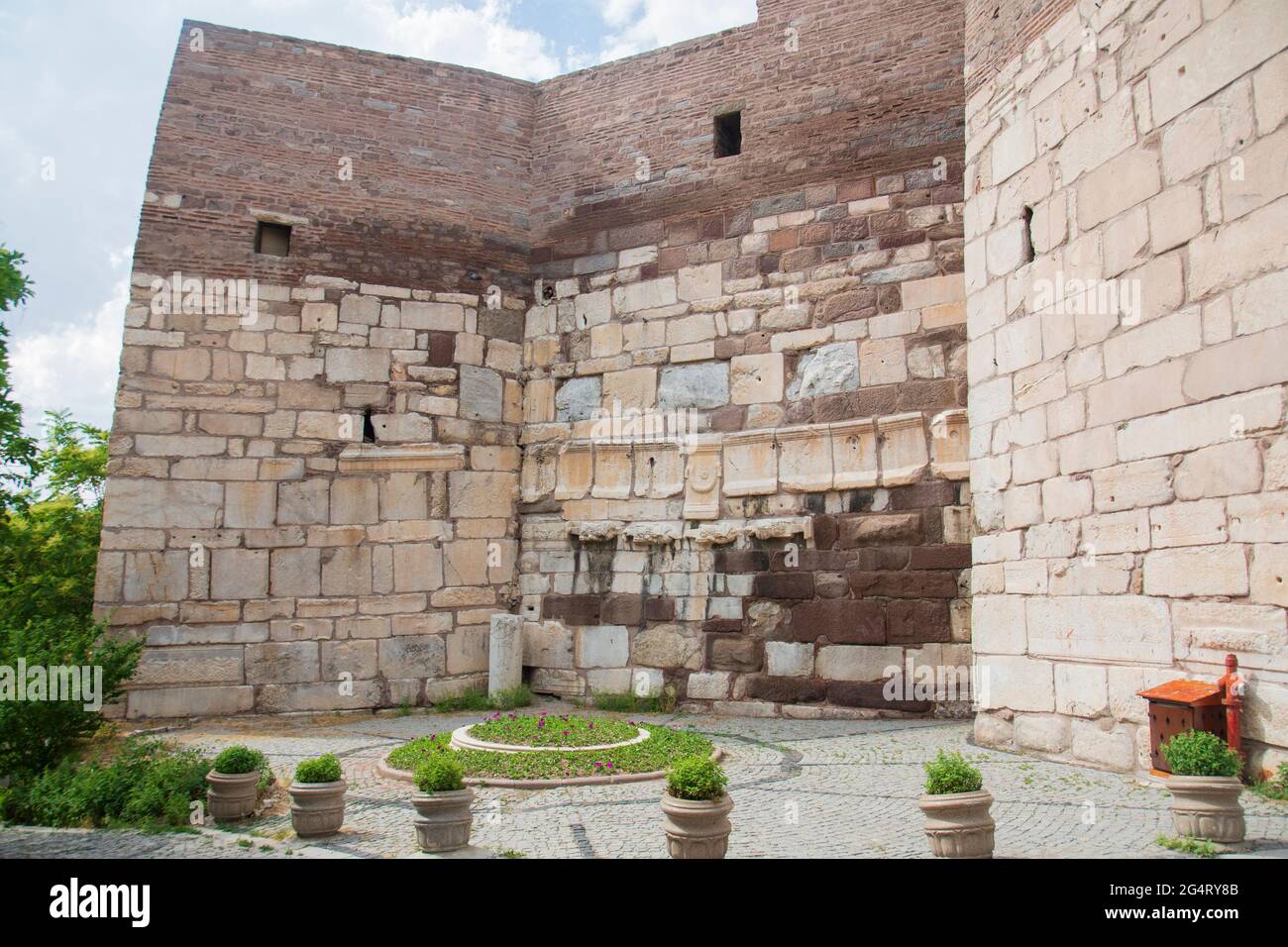The walls of the Ankara Castle, built with stones of different sizes, previously used in other ancient buildings. Stock Photo