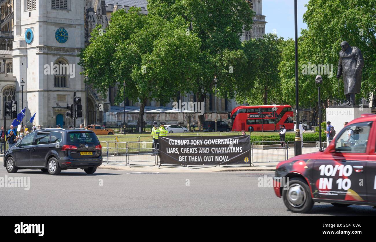 Parliament Square, London, UK. 23 June 2021. Anti Brexit action group Sodem Action take over junctions leading to Parliament at Parliament Square in Westminster with large banners and vocal protests. Credit: Malcolm Park/Alamy Live News Stock Photo