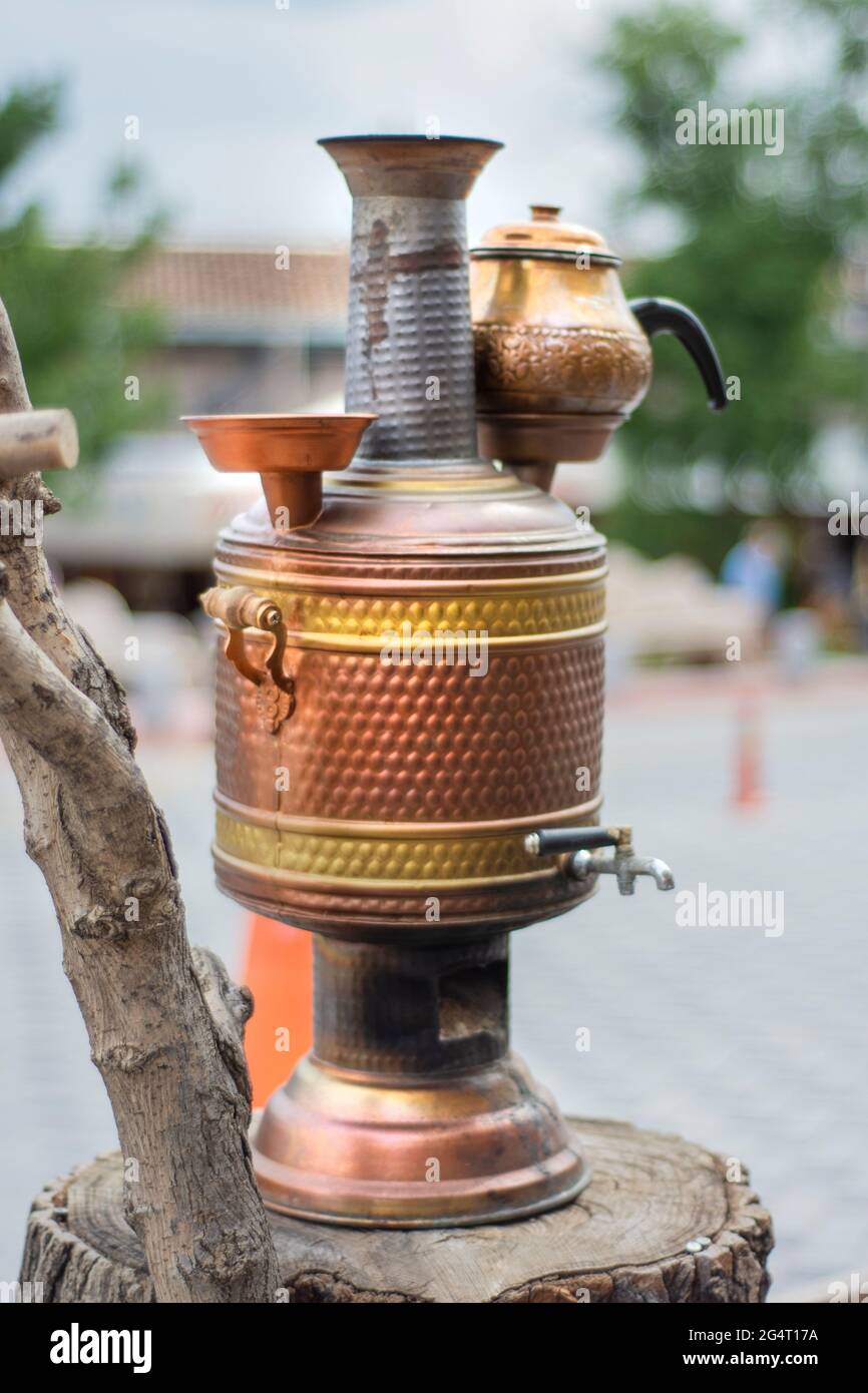 copper color, tin samovar. ideal for brewing tea outdoors Stock Photo