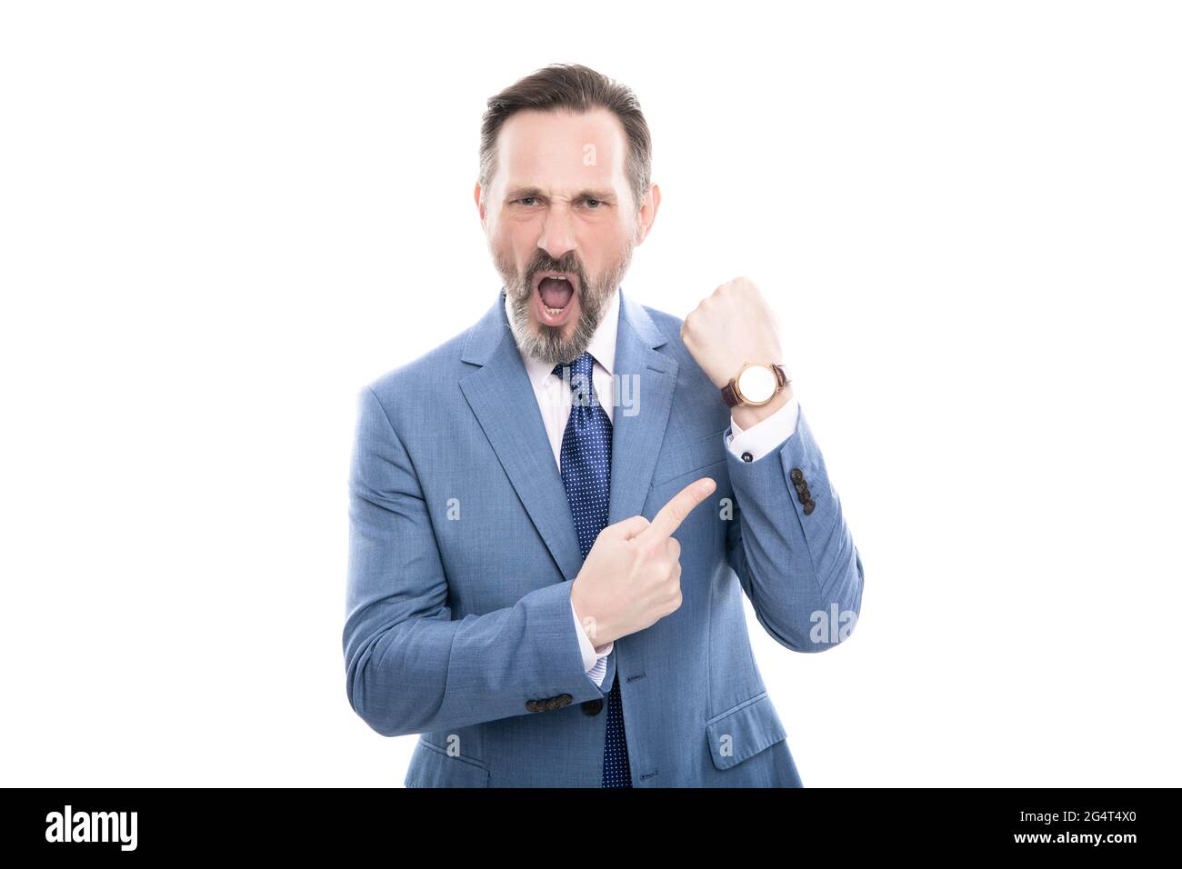 angry mature director in suit pointing finger on time on watch isolated on white, late. Stock Photo