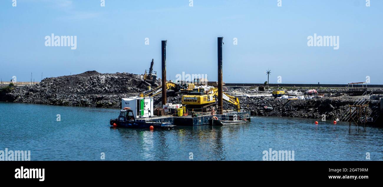 Construction work on a pier extension in Howth Harbour, Dublin, Ireland. New berthing facilities will be provided. Stock Photo