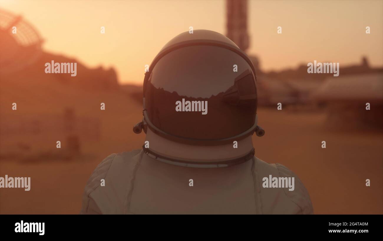 Astronaut on the planet Mars. Astronaut walking on the surface of Mars ...