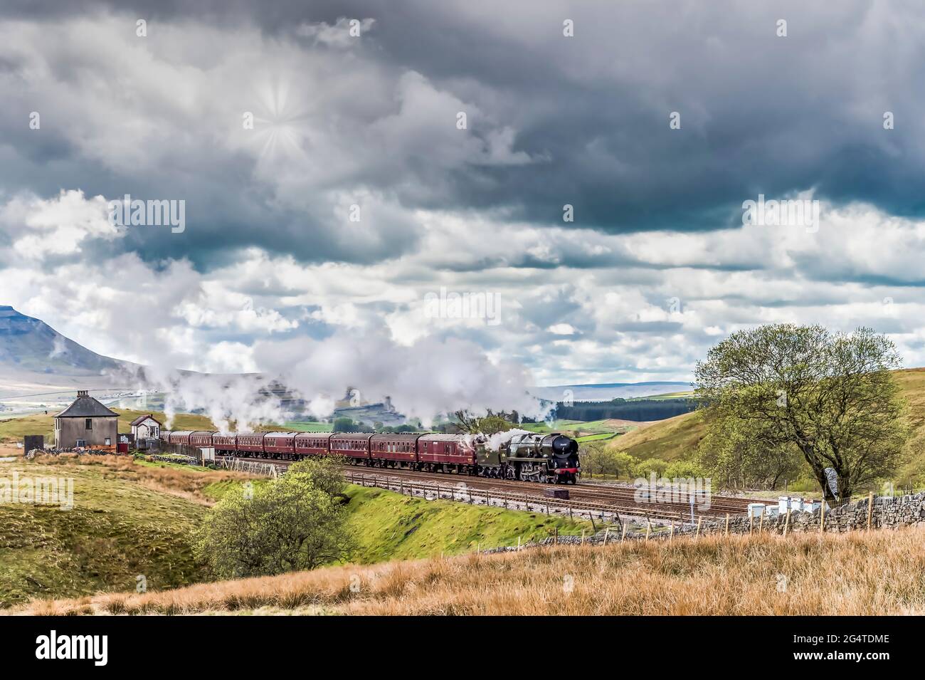 This is the British India Line steam train 35018, after passing Blea moor signal box heading north on the scenic Settle to Carlisle railway line Stock Photo