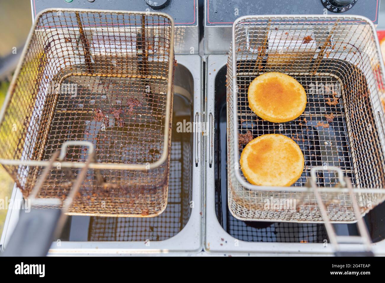 Cheese balls process Fryer for potatoes with boiling oil fast food