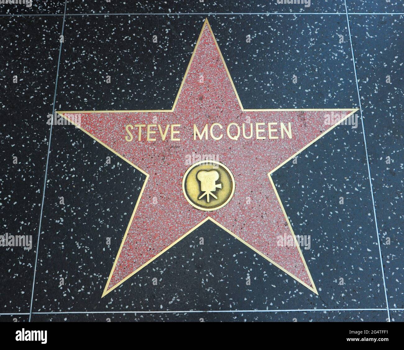 The Hollywood Walk of Fame comprises more than 2,690 five-pointed terrazzo and brass stars embedded in the sidewalks along 15 blocks of Hollywood Boul Stock Photo