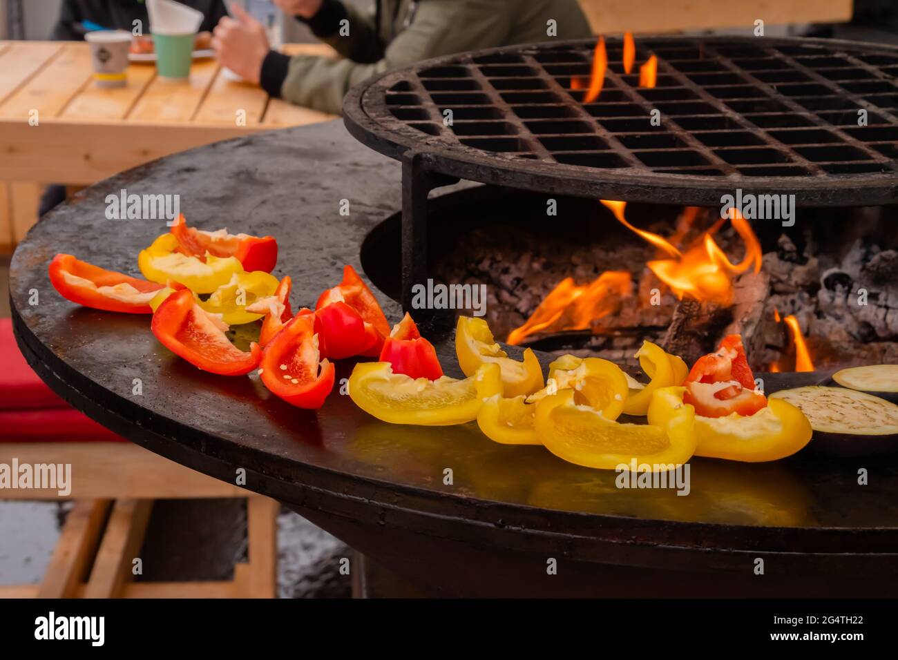 Process of grilling healthy sliced red, yellow sweet bell pepper Stock ...