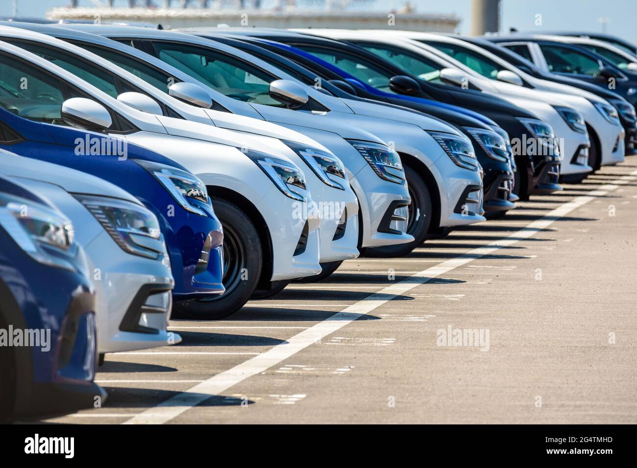 Row Of Brand New Cars Lined Up Outdoors In A Parking Lot Stock Photo Alamy Row Of Brand New Cars Lined Up Outdoors In A Parking Lot Stock Photo Alamy