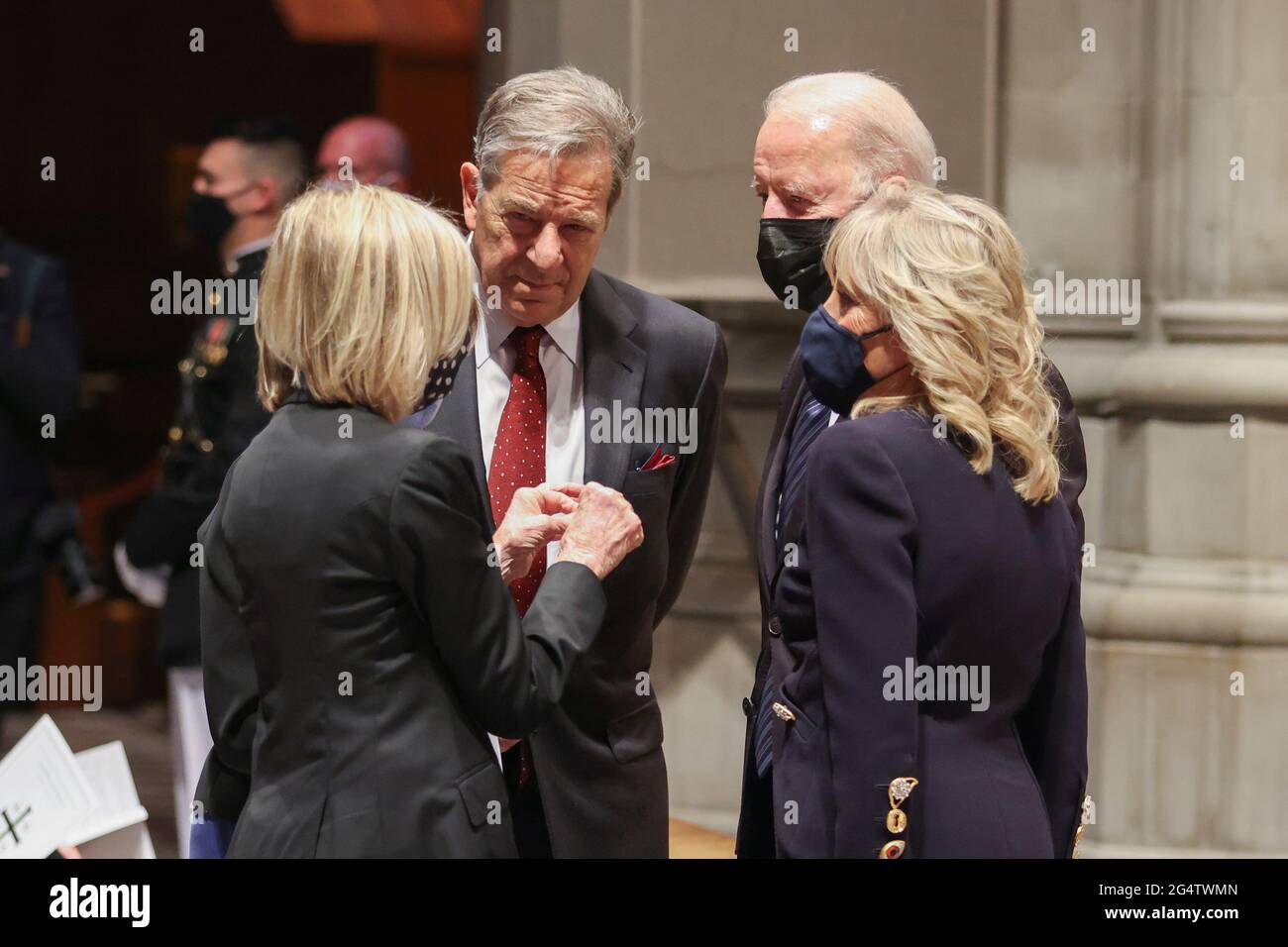 Paul Pelosi stands with President Joe Biden and first lady Jill Biden as they listen to a guest at the funeral ceremony of former Senator John Warner at Washington National Cathedral in Washington, DC, U.S. June 23, 2021. Oliver Contreras/Pool via REUTERS Stock Photo