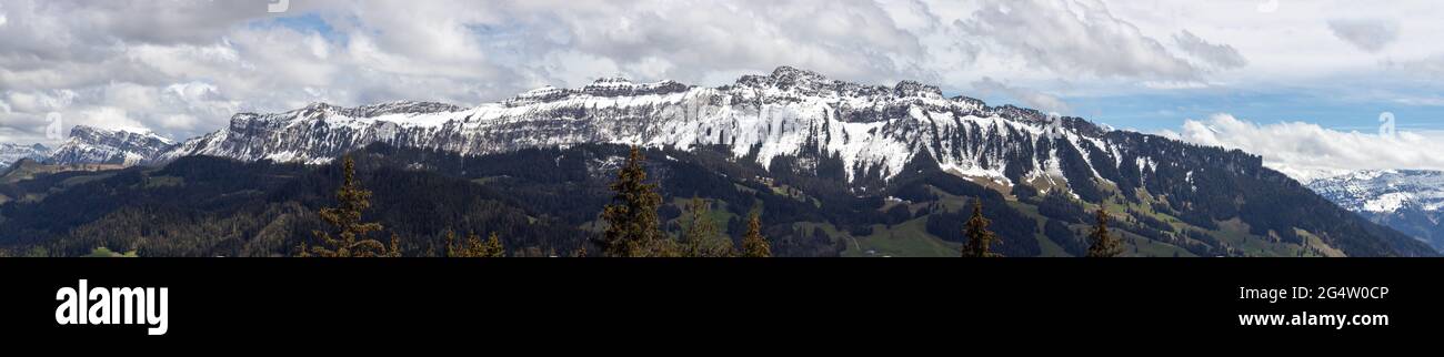 Panoramic view of sigriswil mountain ridge covered in snow Stock Photo