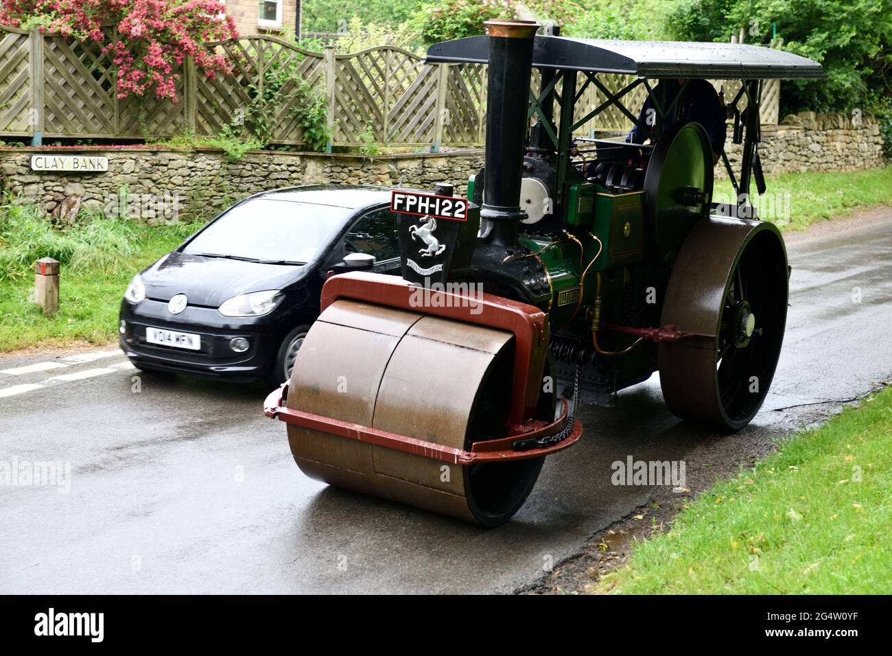 Car overtaking Steam Roller Stock Photo Alamy