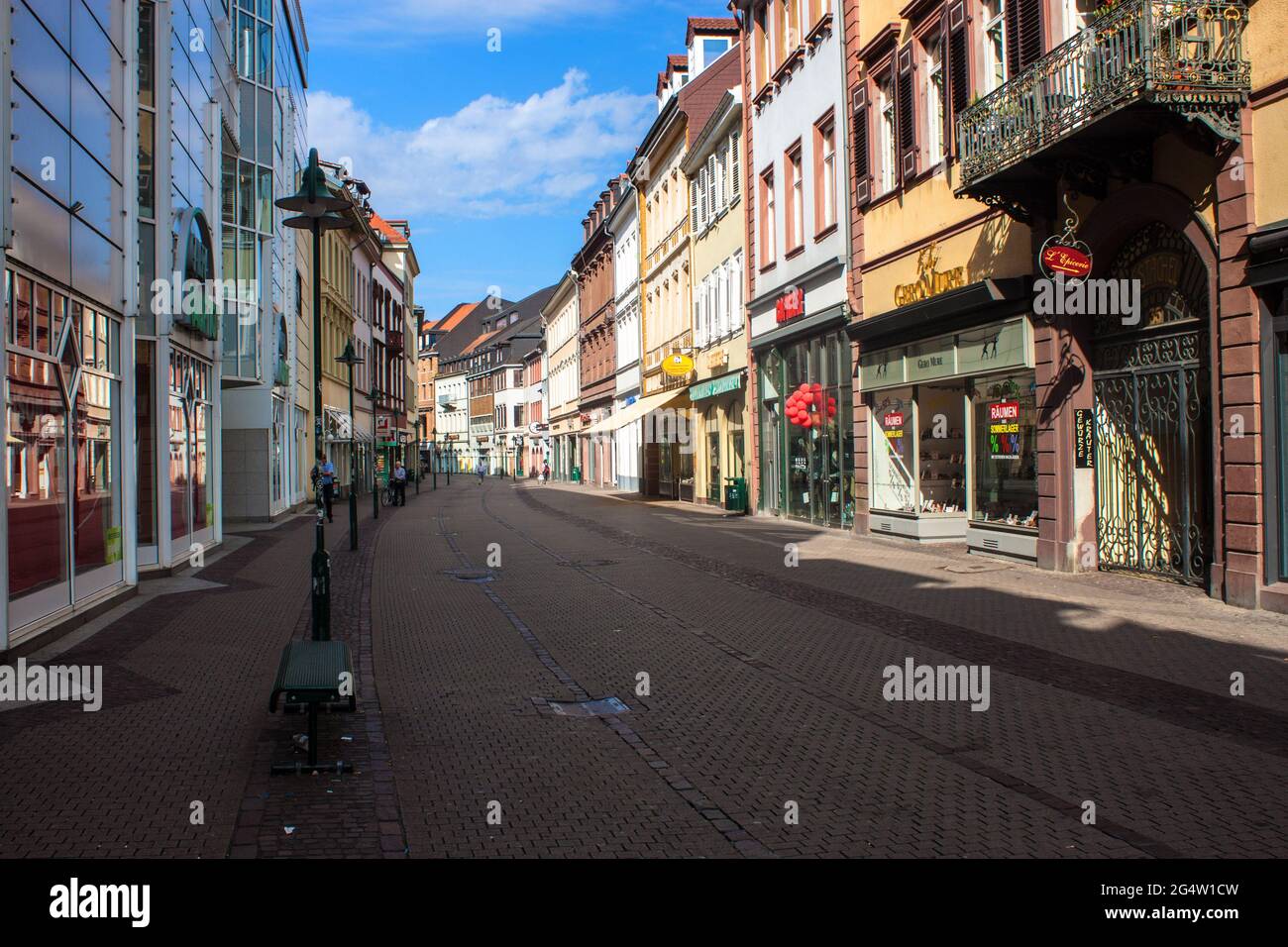 HEIDELBERG, GERMANY - AUGUST 4: Hauptstrasse in the old town of Heidelberg, Germany, on August 4, 2013. Heidelberg is one of the most popular tourist Stock Photo