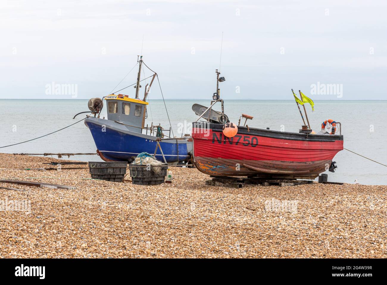Two small fishing boats on Fisherman’s beach, Hythe, Kent, UK Stock