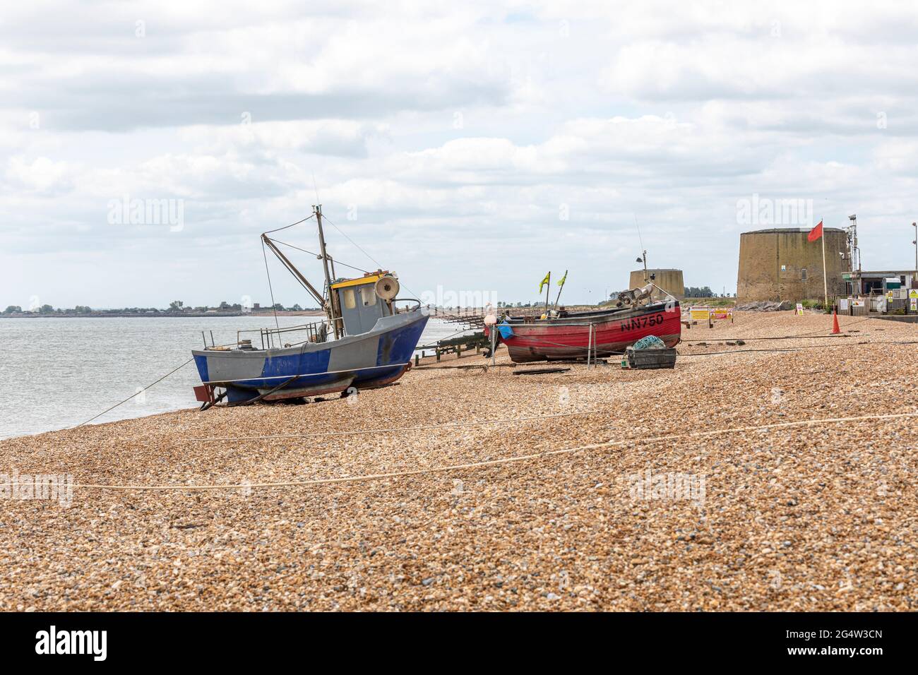 Two small fishing boats on Fisherman’s beach, Hythe, Kent, UK Stock
