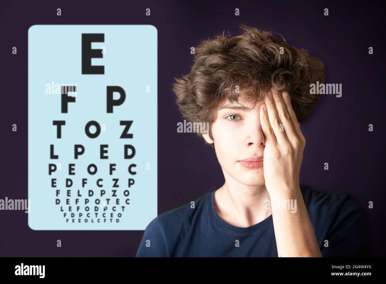 young male test eye vision and cover eye with hand Stock Photo Alamy