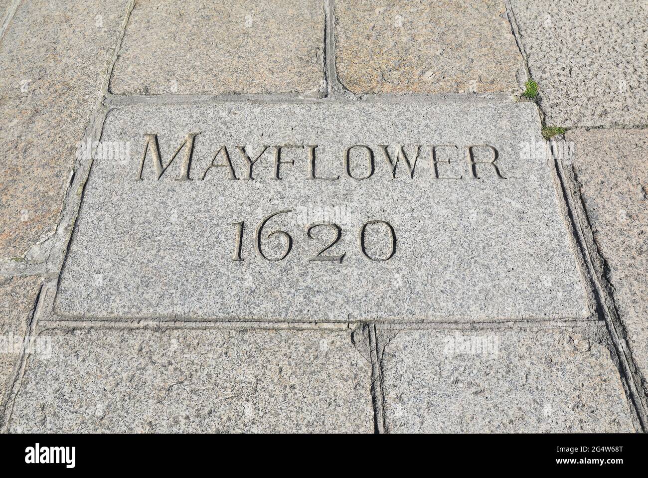 The granite stone marking the approximate site from where the Mayflower ship sailed to America with 102 pilgrims in 1620, in Plymouth, Devon Stock Photo