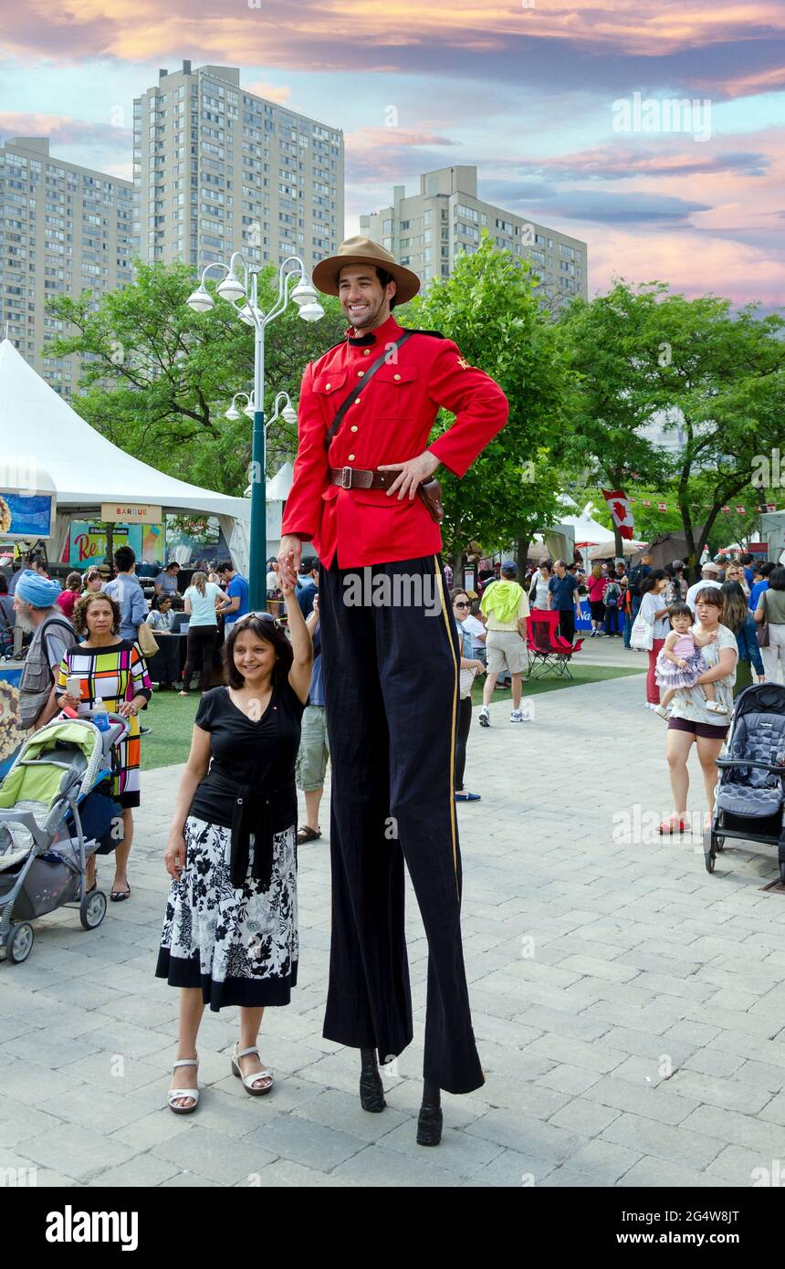 Man on stilts hires stock photography and images Alamy