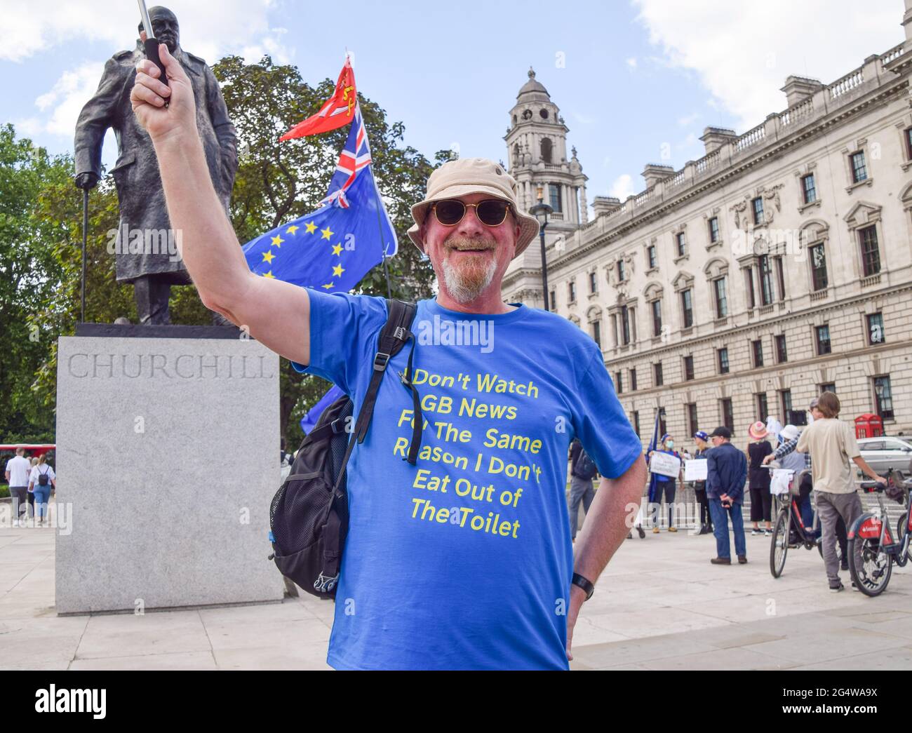 London, UK. 23rd June, 2021. A demonstrator wears an anti-GB News t-shirt during the anti-Brexit protest outside the parliament in London.Protesters gathered outside the Houses of Parliament on the fifth anniversary of the referendum. Credit: SOPA Images Limited/Alamy Live News Stock Photo
