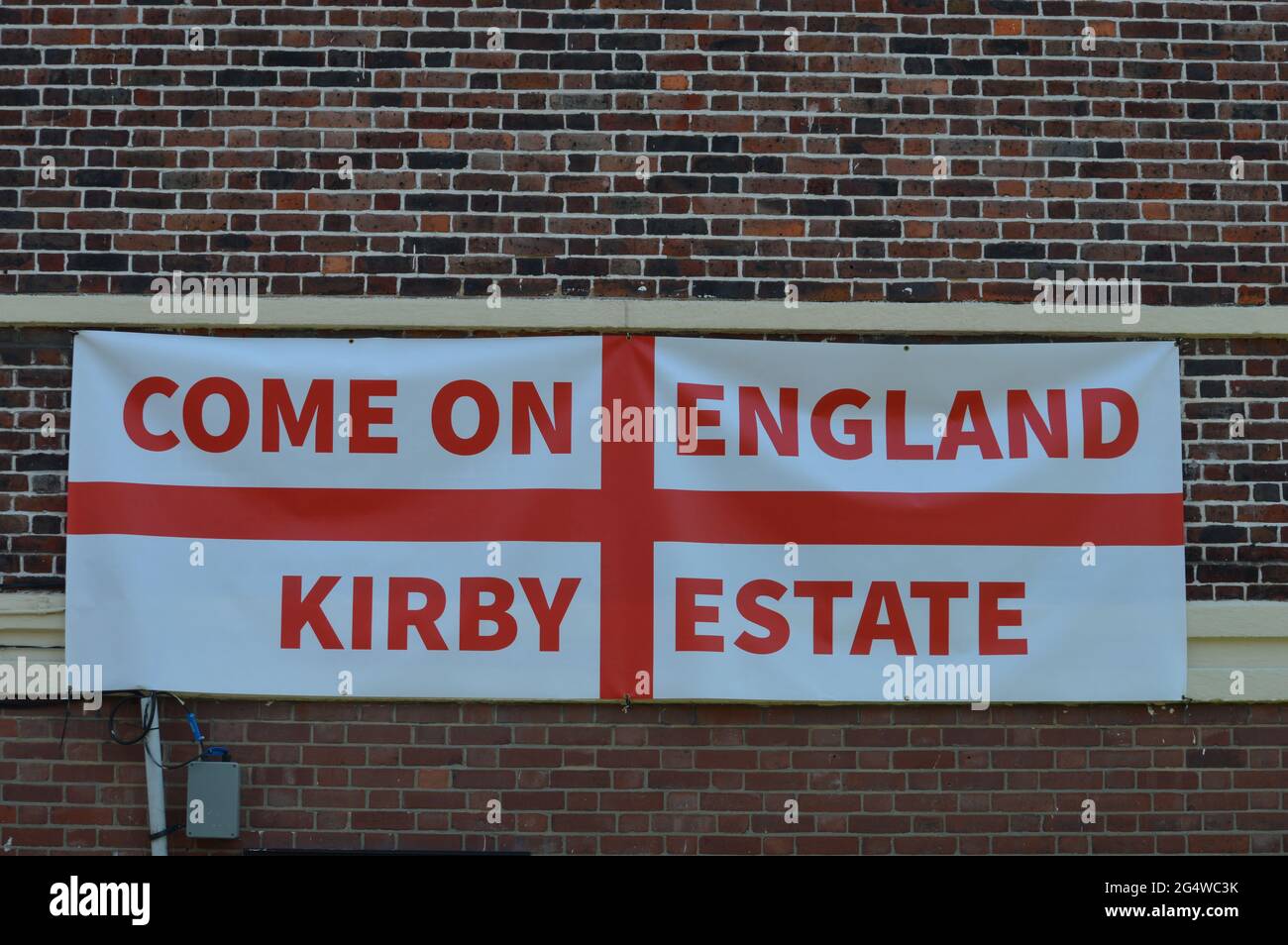 London, UK. 23 June 2021. Patriotic residents in Kirby Estate cover their balconies in England flags for duration of the Euro 2020 tournament. Stock Photo