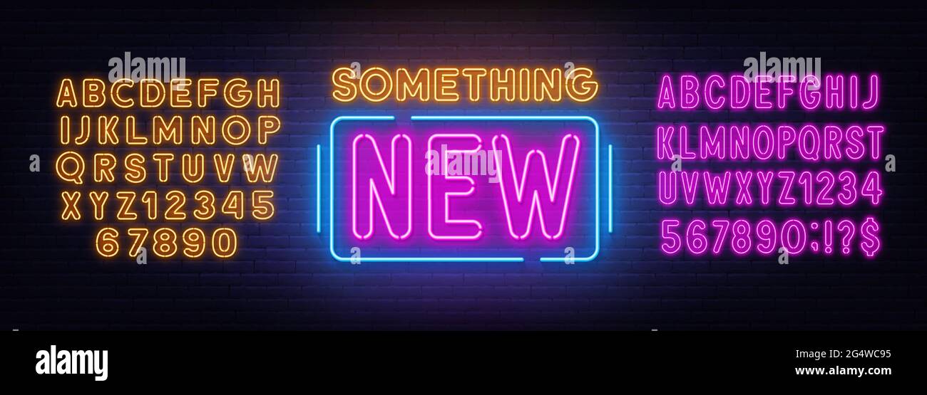 Something new neon sign on brick wall background. Yellow and pink neon ...