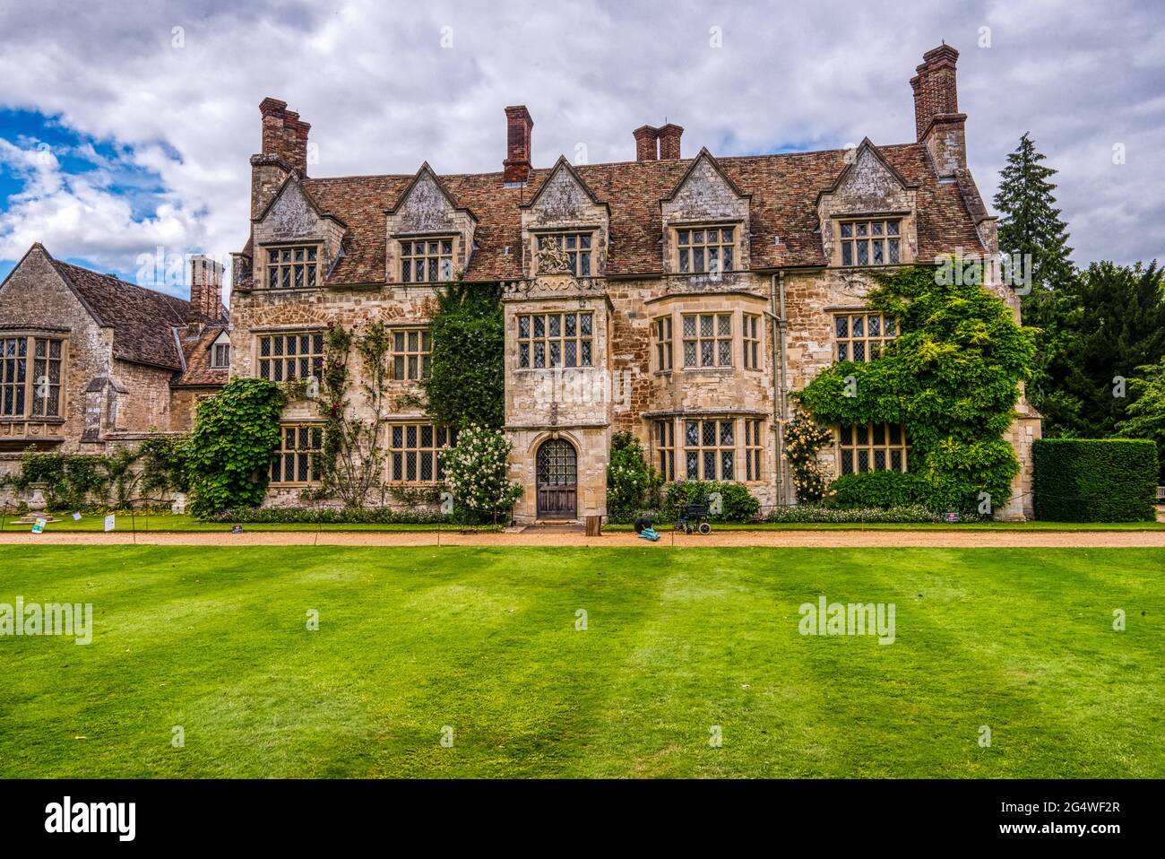 Attractive country mansion. Anglesey Abbey, a Jacobean-style country house at Lode, near Camdridge, UK, now part of the British National Trust. Stock Photo
