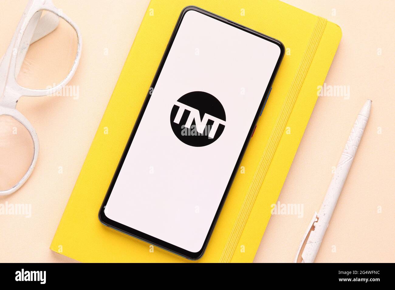 TNT tv logo on phone screen stock image. Stock Photo