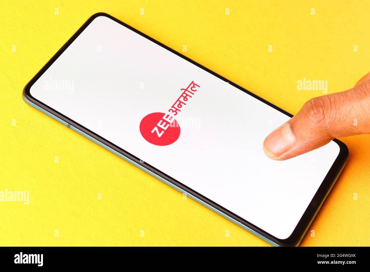 Zee Anmol logo on phone screen stock image Stock Photo - Alamy, image size:1300x956