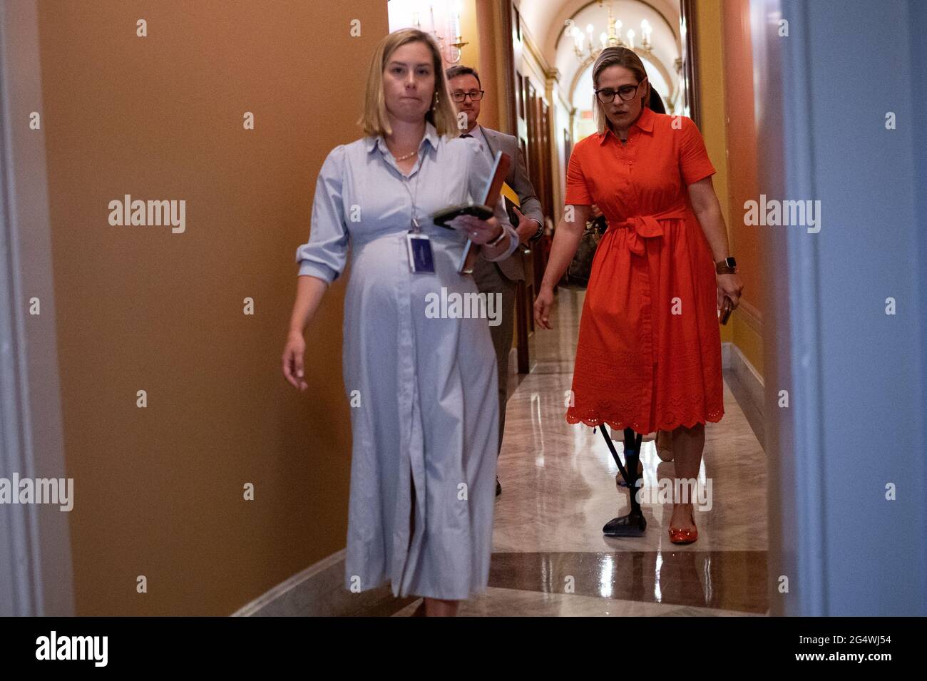 Washington, USA. 23rd June, 2021. Senator Kyrsten Sinema (D-AZ) leaves a bipartisan meeting of Senators where they discussed infrastructure legislation, at the U.S. Capitol, in Washington, DC, on Wednesday, June 23, 2021. Last night Senate Republicans filibustered a voting rights bill as bipartisan negotiations over infrastructure legislation grind on with little apparent progress building a package to beat the 60-vote filibuster threshold. (Graeme Sloan/Sipa USA) Credit: Sipa USA/Alamy Live News Stock Photo