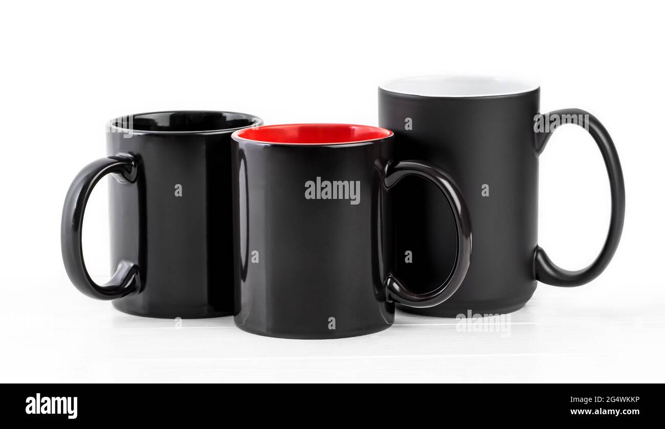 Set of three black cups isolated on white background Stock Photo