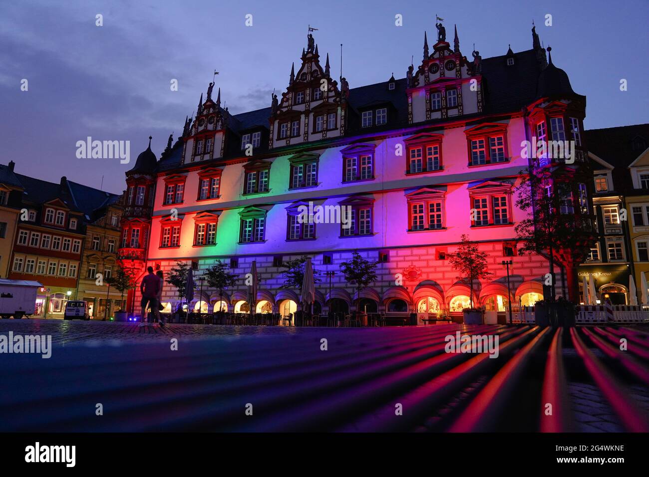 Coburg, Germany. 23rd June, 2021. Football: European Championship, Germany - Hungary, preliminary round, Group F, 3rd matchday: Coburg's town hall is illuminated in rainbow colours. The illumination is a reaction to UEFA's decision. Credit: Nicolas Armer/dpa/Alamy Live News Stock Photo