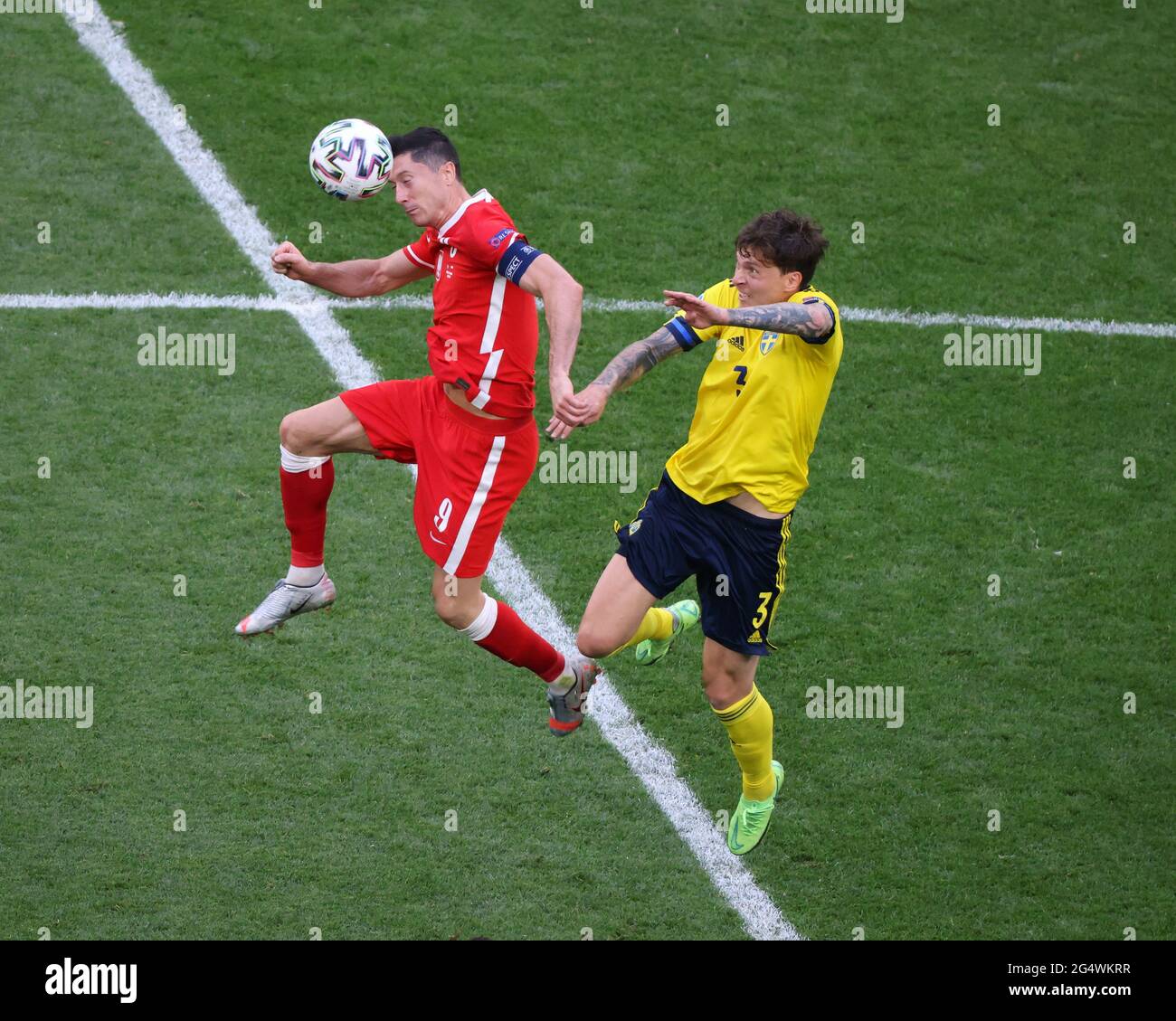 Saint Petersburg, Russia. 23rd June, 2021. Robert Lewandowski (9) of Poland and Victor Lindelof (3) of Sweden are seen in action during the European championship EURO 2020 between Poland and Sweden at Gazprom Arena. (Final Score; Poland 2:3 Sweden). Credit: SOPA Images Limited/Alamy Live News Stock Photo