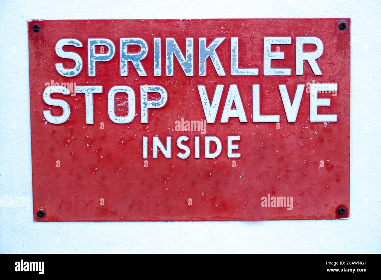 'Sprinkler Stop Valve Inside' Sign Stock Photo