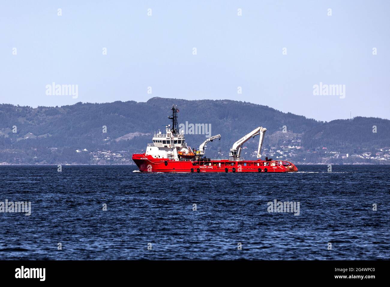 Offshore supply AHTS vessel BB Ocean at Byfjorden, departing from port of Bergen, Norway. Stock Photo