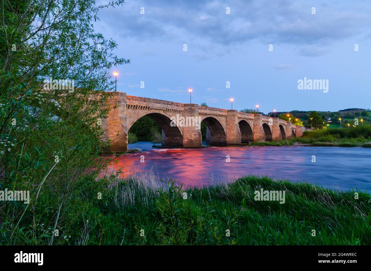 Twilight at Corbridge Bridge, Northumberland, Viewed from a Riverside Pathway Stock Photo