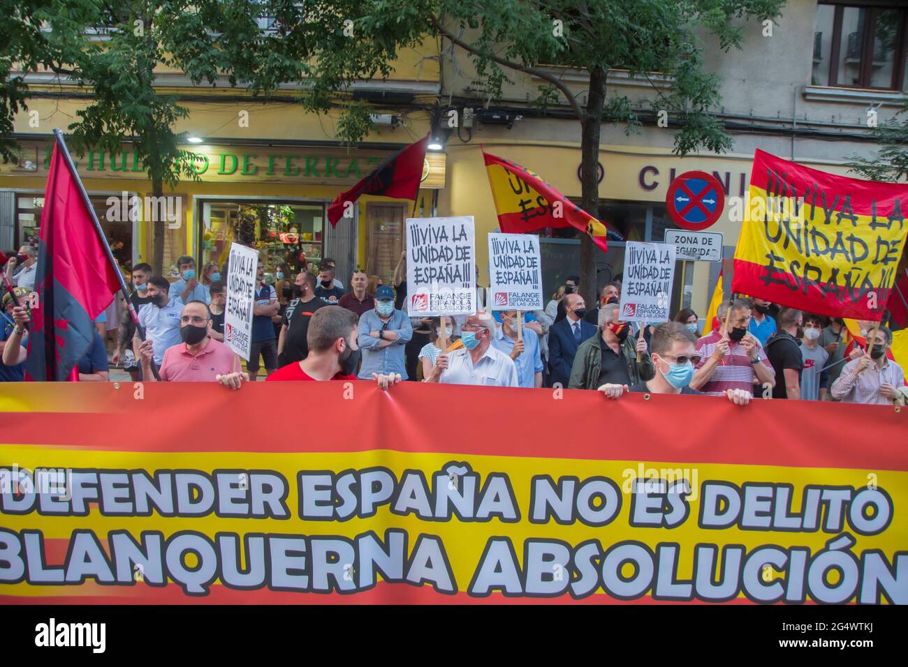 Only a hundred people have gathered at the national headquarters of the PSOE, located in Madrid's Ferraz street, to express their rejection of the pardon decrees published this Wednesday in the Official State Gazette, to the nine independence leaders imprisoned for the events that occurred on October 1, 2017.  Different groups of the extreme right had called to gather at the headquarters of the Socialists hours after the release of Dolors Bassa, Oriol Junqueras, Jordi Cuixart, Jordi Sànchez, Carme Forcadell, Raül Romeva, Joaquim Forn, Josep Rull and Jordi Turull. His intention was to lead an i Stock Photo