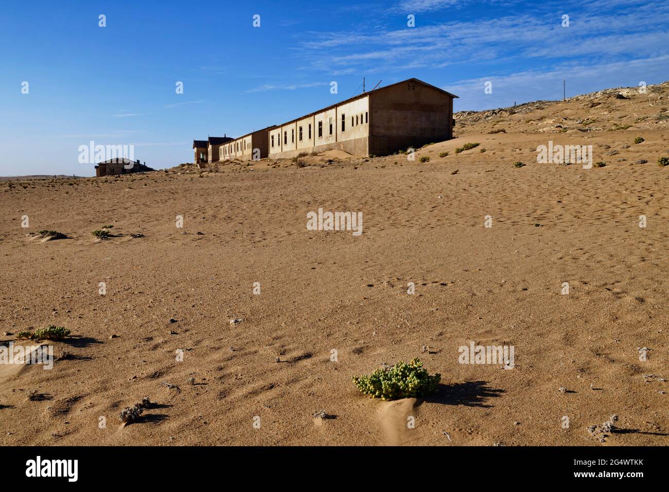 Ghost town Kolmanskop in Namib desert near Lüderitz: buildings in former mining town, Sperrgebiet National Park, Karas Region, Namibia Stock Photo