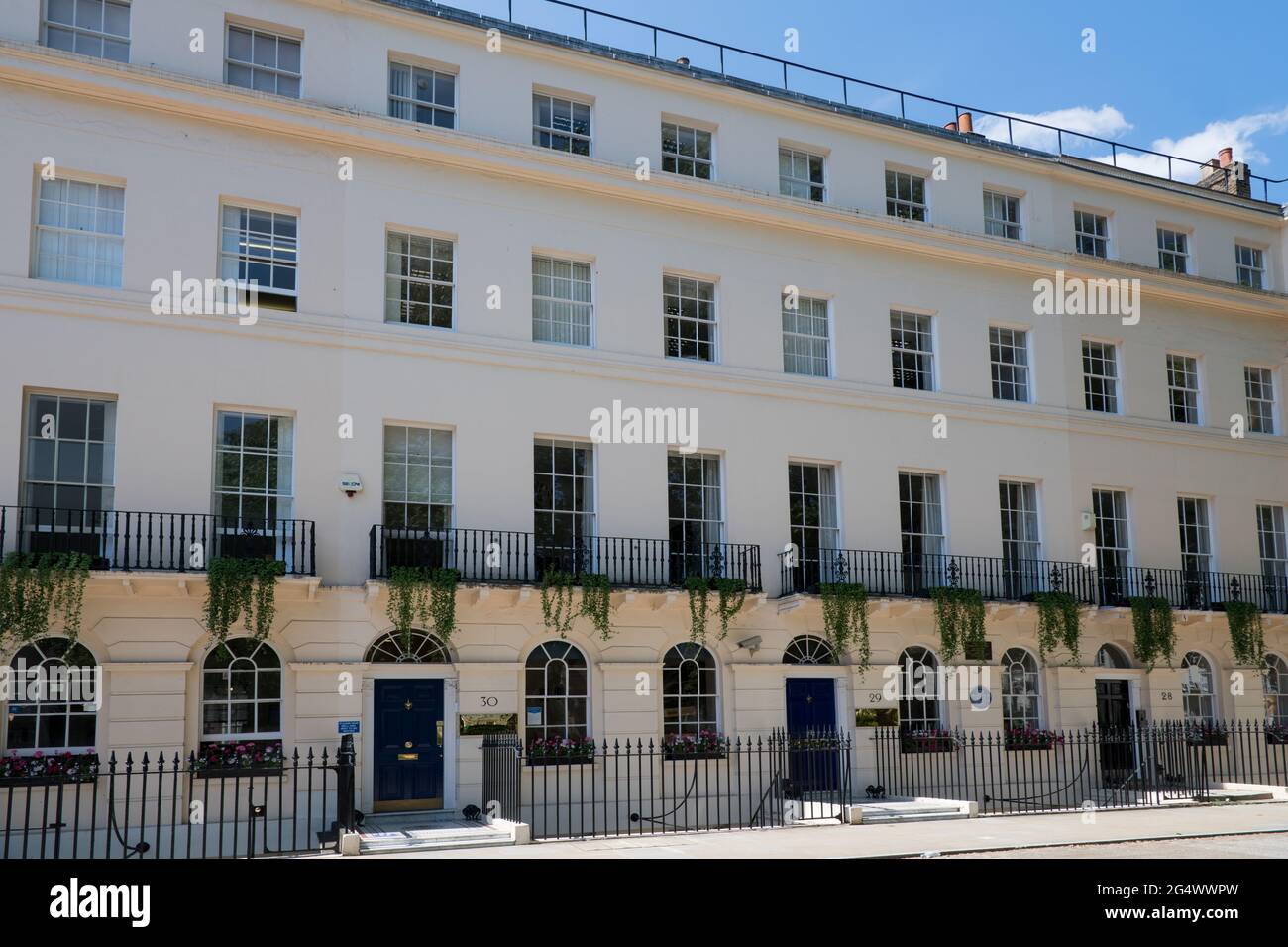 Beautiful terrace houses Conway Street west side Fitzroy Square Central London England Stock Photo