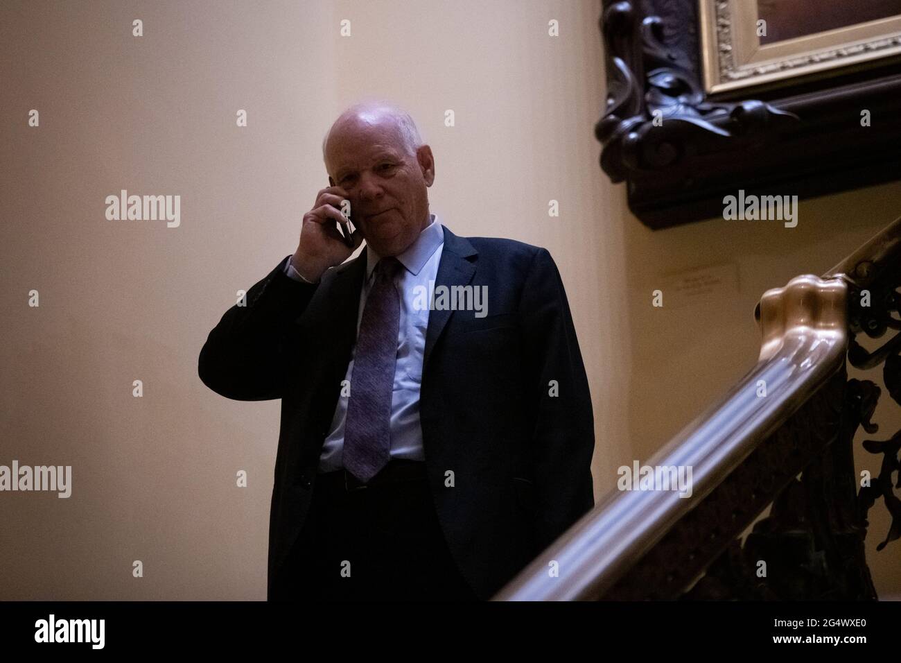 Washington, USA. 23rd June, 2021. Senator Ben Cardin (D-MD) talks on the phone, at the U.S. Capitol, in Washington, DC, on Wednesday, June 23, 2021. Last night Senate Republicans filibustered a voting rights bill as bipartisan negotiations over infrastructure legislation grind on with little apparent progress building a package to beat the 60-vote filibuster threshold. (Graeme Sloan/Sipa USA) Credit: Sipa USA/Alamy Live News Stock Photo