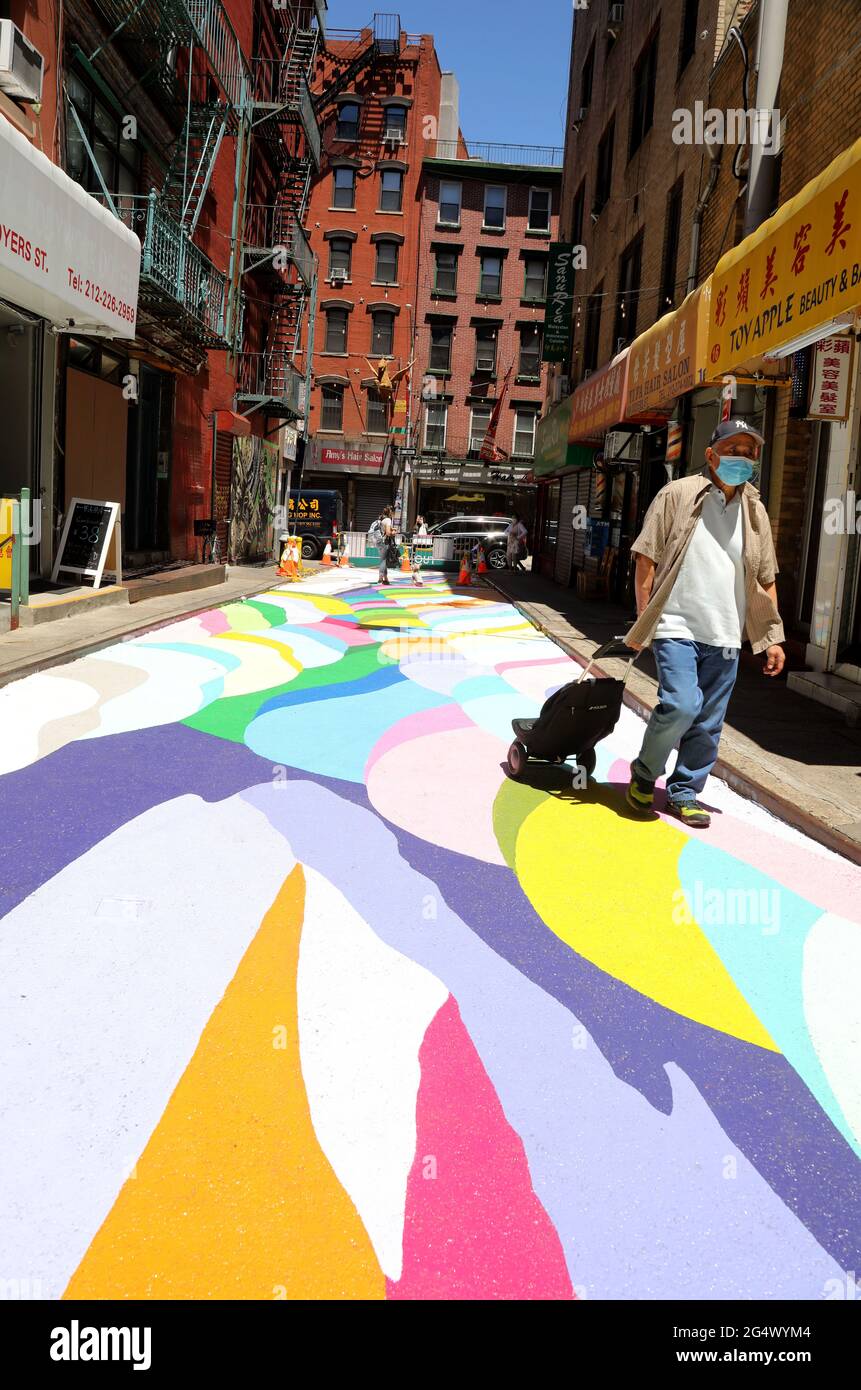 New York, New York, USA. 23rd June, 2021. A view of 'The Rice Terraces'  street mural by Chilean-born street artist Dasic Fernandez, seen on Doyers  Street in Chinatown as part of the