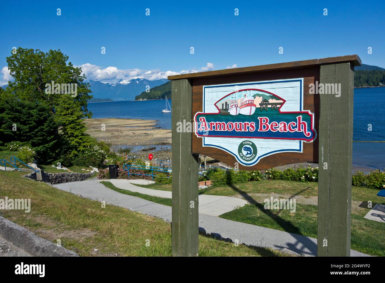 Armours Beach sign in Gibsons, British Columbia, Canada.  View of the water and mountains, on the Sunshine Coast. Stock Photo