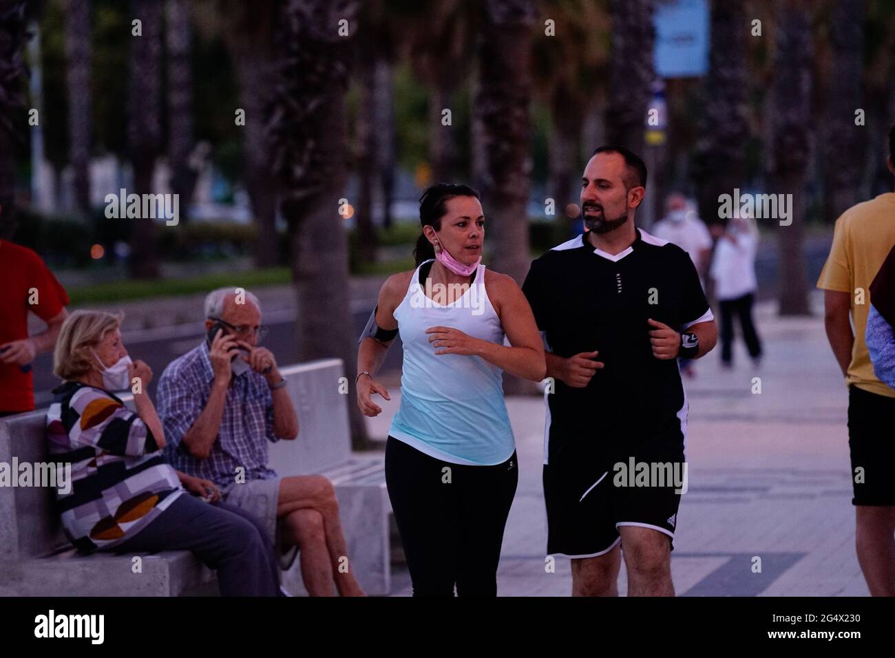 Malaga, Spain. 23rd June, 2021. p>Two people seen jogging without ...