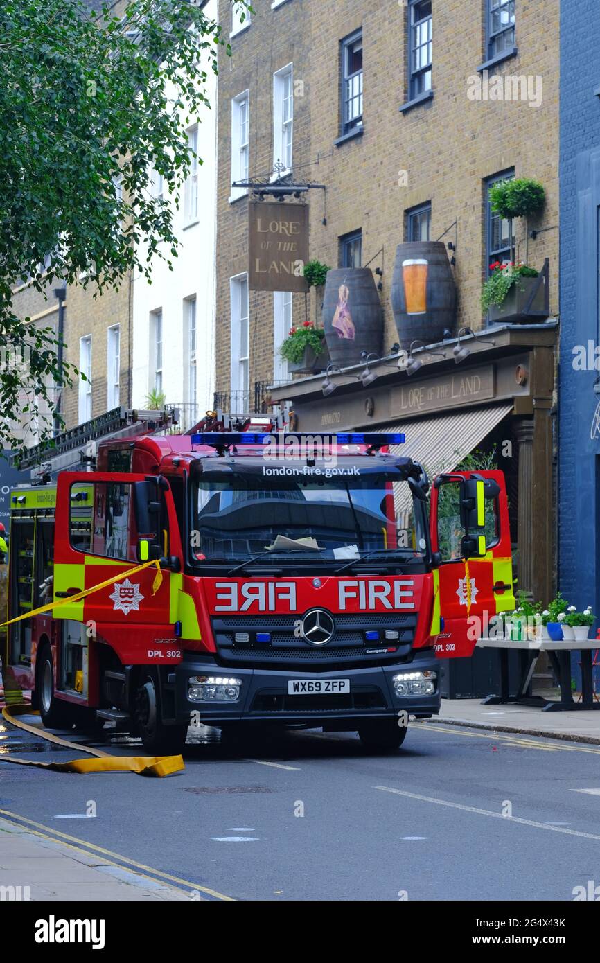 A fire engine at the scene of a fire that broke out at film director Guy Ritchie's pub in Camden. Stock Photo