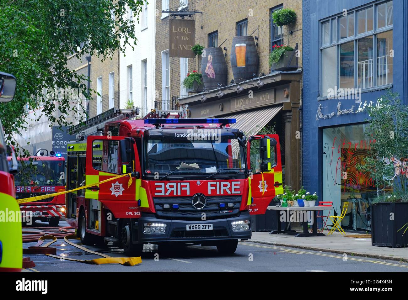 A fire engine at the scene of a fire that broke out at film director Guy Ritchie's pub in Camden. Stock Photo