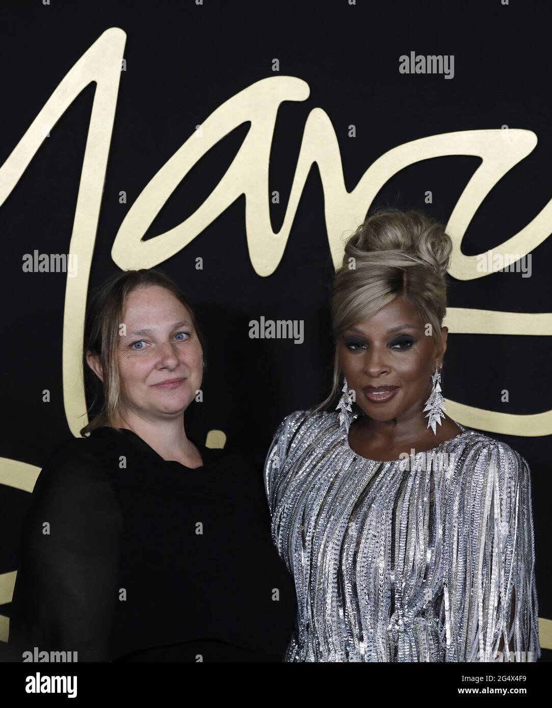 New York, United States. 23rd June, 2021. Mary J. Blige, American singer,  songwriter and actress (R) arrives with film director Vanessa Roth arrive  on the red carpet for the premiere of the
