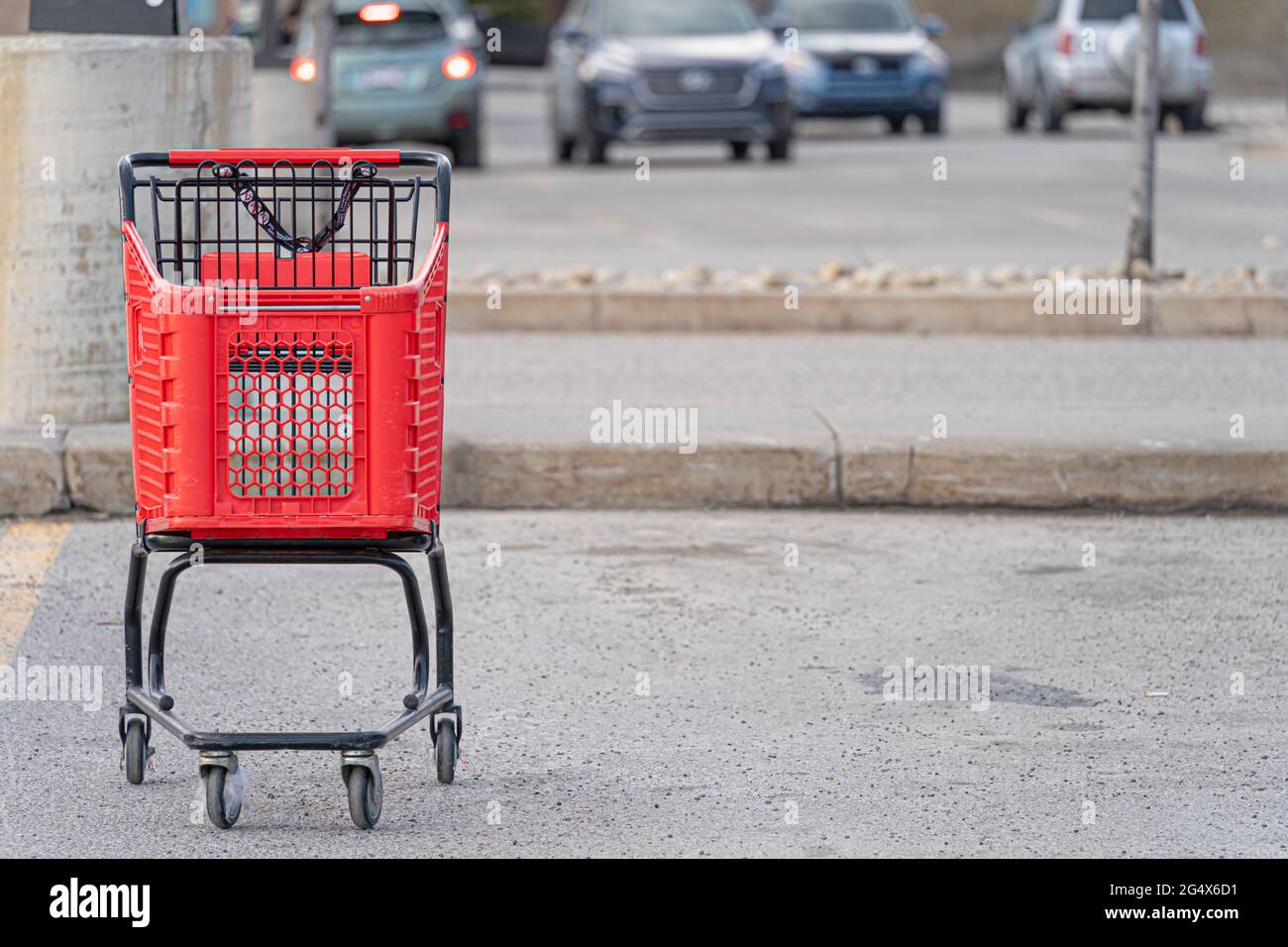 shopping cart outside in supermarket parking lot Stock Photo Alamy