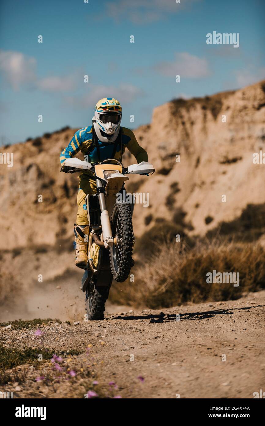 Sportsman riding enduro motorcycle on dirt road Stock Photo Alamy
